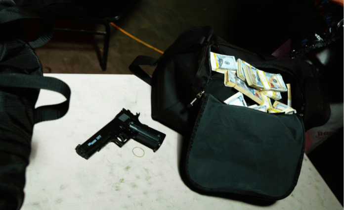 Gun and money